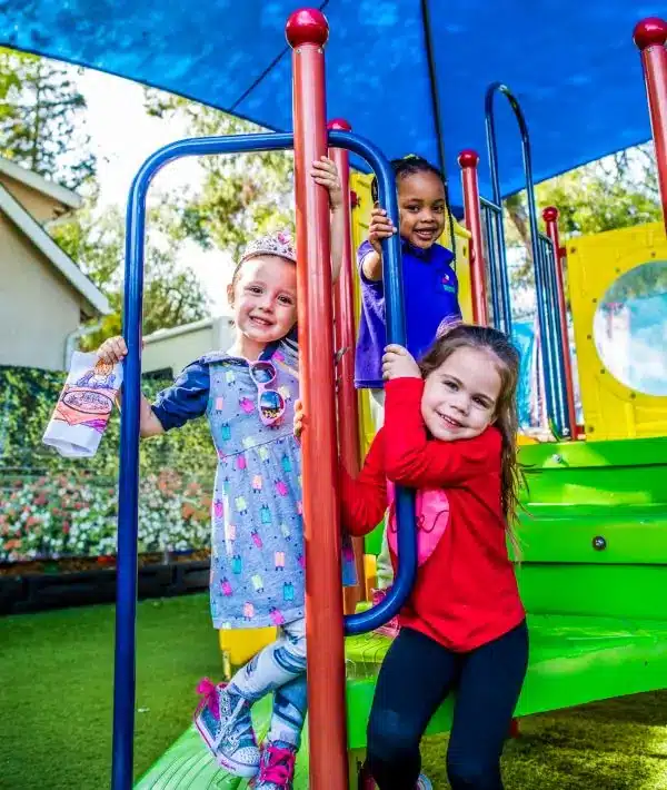 Preschoolers playing on playground